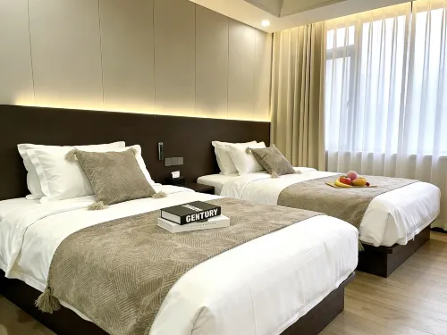 Damei Homestay (Kaifeng Wansui Mountain Wuxia City Millennium City Park) - خدمة نقل من وإلى المطار