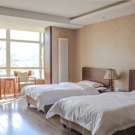Three Bears Apartment Hotel (Zhangjiakou Rongchen) Отели рядом с достопримечательностью «Центральная больница в районе Цуйли»