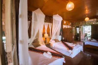 The Antique Riverside Resort Hotels in Photharam District