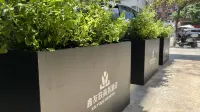 Xinyoulian Business Hotel