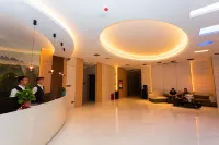 Xingyi Mugui Smart Hotel (Jushan Square DCF)