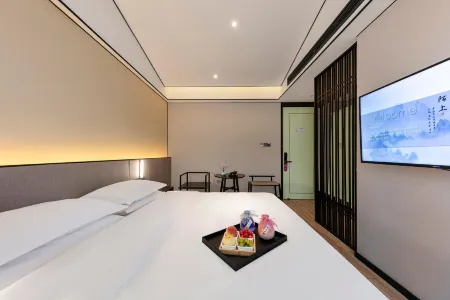 Moshang Qingju Hotel (Yuzhou East Trading Street Branch) Отели рядом с достопримечательностью «Yuzhou Forest Botanical Garden»