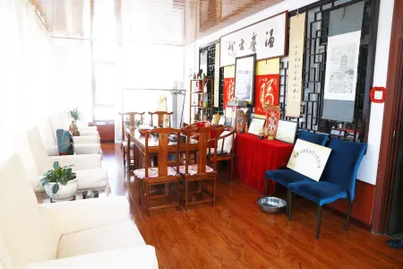 Warm Inn Отели рядом с достопримечательностью «Lvliang University»