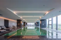 Howard Johnson Goutou Plaza Zigong - ที่มีสระว่ายน้ำ