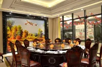 Qapcha'er Hotel (Yuanpuyuan Branch) - فطور