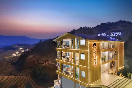 Longji Huanxi Lanyue Panoramic Homestay Отели рядом с достопримечательностью «Golden Buddha Peak View Point»