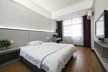 Xintian Haoting Business Hotel Отели рядом с достопримечательностью «Shuangbi Square»