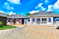 The Biira Residence Hotels near Kyewaga Central Forest Reserve