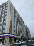 Shiguang Homestay (Qushi Times Business Plaza)