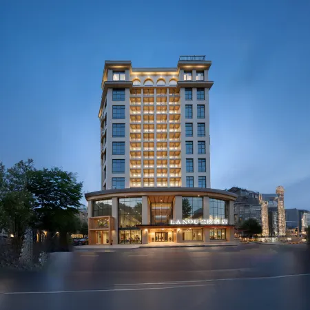 LANOU Hotel (Huangshi Yingbin Avenue Huahu Railway Station) Отели в г. Хуанши