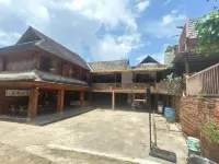Manghong Yongbanghao · Traditional Blang Stilt‑House (Jingmai Ancient Tea Forest) - breakfast