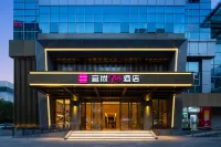 Echarm Plus Hotel (Hangzhou Binjiang Olympic Expo City) Hotel di Hangzhou