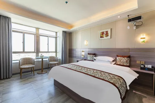 Aiju apartment (Xinxi store of Shantou high speed railway station) - 인 (Inns)