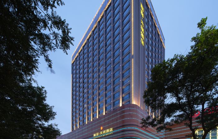 Li Cai Tian Qi Hotel