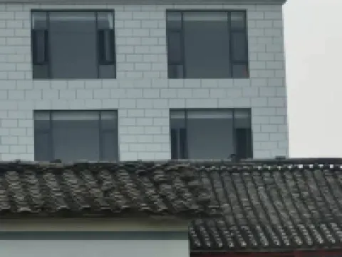 Xinmengyuan Hotel فنادق في لوى بينغ