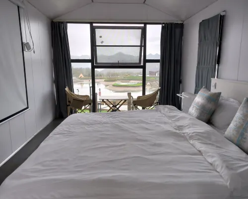 Deshell Turtle Camp Hotel (Daqi Xiling Snow Mountain Branch) Zimmer Photos