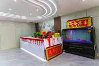 Tumxuk Yixin Business Hotel