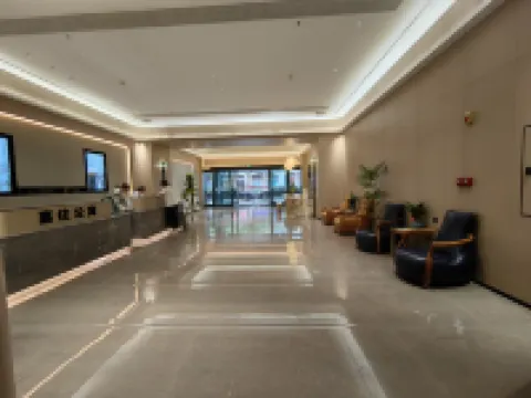 Xizhu Apartment Happy Stay (Zhanjiang Jinshawan Yingzhan Plaza)