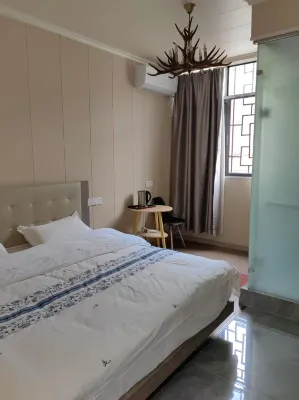 Qiqi Homestay - Auberges