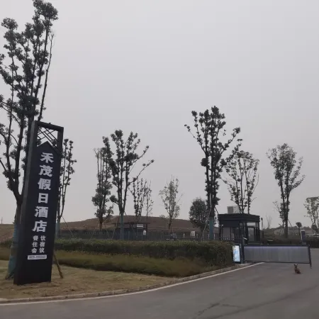 Wusheng Hemao Holiday Hotel
