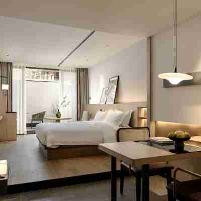 SFEEL設計師酒店(樂山張公橋美食街店) Rooms