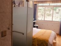 丹巴南河美谷主题酒店 - 温馨大床房
