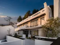 Jiuhuashan Xiangzili Homestay (Meat Body Palace Branch) فنادق في تشينغيانغ