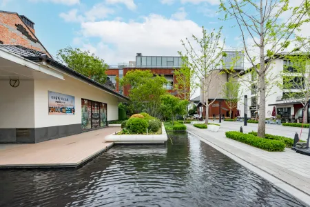 Floral Hotel · Zhuli Yunshe hotel Отели рядом с достопримечательностью «Kezhi Garden»