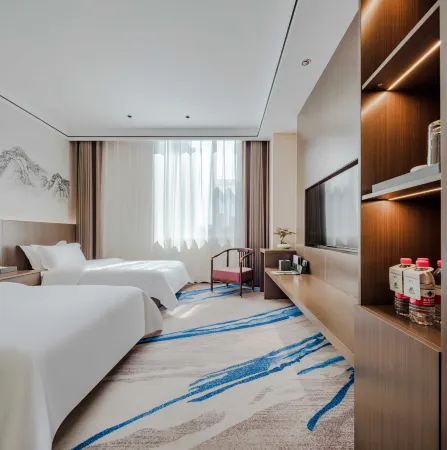 Taiyuan Huagang Business Hotel Отели рядом с достопримечательностью «Taiyuan Botanical Garden»