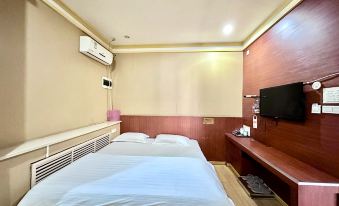 Xinjia Hotel (Qiqihar No. 3 Middle School)