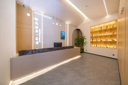 Shiguang Hot Spring Boutique Hotel Отели рядом с достопримечательностью «Yuyi Tangquan Shuishang Paradise»