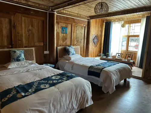 Leishan Xipan Xianshe Homestay - Bar