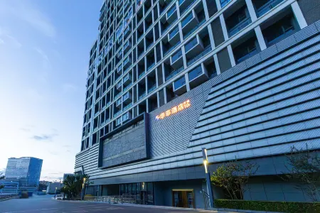 Huafei Hotel (Guiyang Longdongbao International Airport Sasseur Outlets) Отели рядом с достопримечательностью «Guiyang University Software Branch»