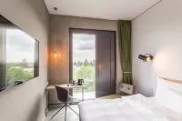 Gambino Hotel Cincinnati Отели в г. Perlach