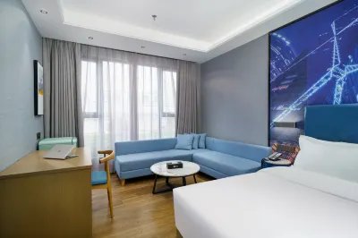 Green Carrier Hotel (Shenzhen Nanshan Coast Chengnan Oil Store) Hôtels à : Shenzhen