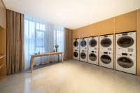 Yining Binjiang Peninsula Hotel (Liuxing Street Scenic Area airport）)