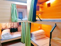 Song Ni Yi Duo Xiao Xue Hua Hostel (Zhongyang Street Ha Railway Station)