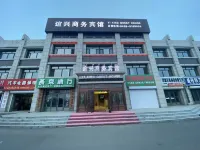 Qinggang Yixing Business Hotel - parcheggio