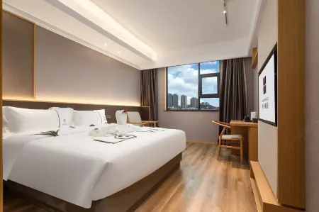 Shizhou Hotel (Mianyang High-speed Railway Station CapitaLand Branch) Отели рядом с достопримечательностью «Yuewang Tower»