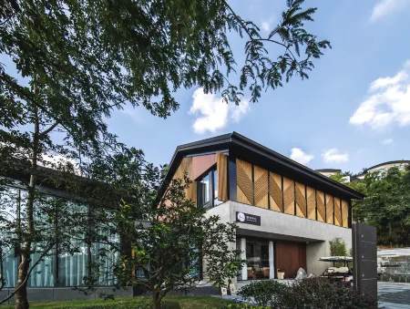 PEIYILODGE LINGFENG Отели рядом с достопримечательностью «Zhejiang Yuxiang Vocational and Technical College»