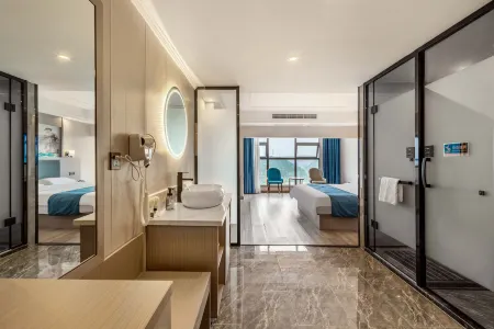 Sunlew Lychen | Pleasant Guanshanhu Cityscape Select Hotel (Guiyang North Railway Station) Отели рядом с достопримечательностью «Jinyang Gymnasium»