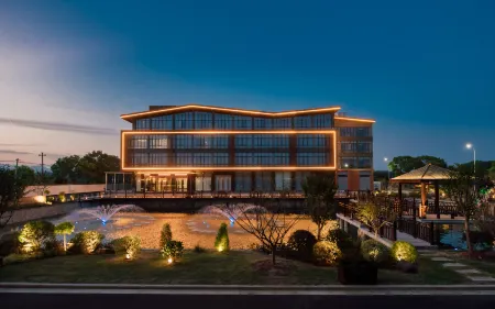 Changxing Xin Heng Art Hotel Отели рядом с достопримечательностью «Changxing Badujie Scenic Area»