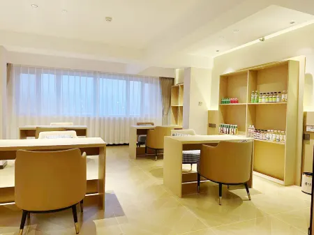 Harbin Hexi Business Hotel Отели рядом с достопримечательностью «Heilongjiang Oriental College»