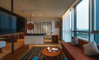 BLOOM BLUE Hotel (Leshan High-speed Railway Station Shihao Plaza)