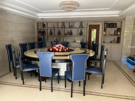 Zhoumu Wenquan Villa Apartment Отели рядом с достопримечательностью «Evergrande Five Nations Hot Spring Town»