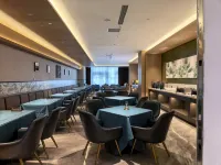 Meihao Lizhi Hotel (Korla Peacock River) - Airport Shuttle