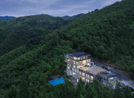 Muyun Guesthouse Отели рядом с достопримечательностью «Jiulongxia Scenic Area»