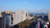 Yuechengju Apartment (Rizhao China Resources Vientiane Huijinhui Times Square Branch)