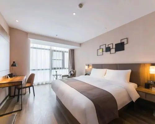 Xinghai Homestay (Zhengzhou Erqi Square Subway Station) โรงแรมในเจิ้งโจว