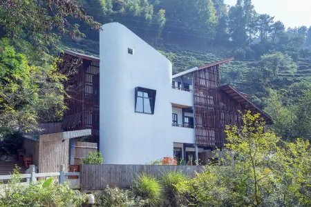 Yannan Hotel Отели рядом с достопримечательностью «Yearning Tea Plantation Tourist Attraction»